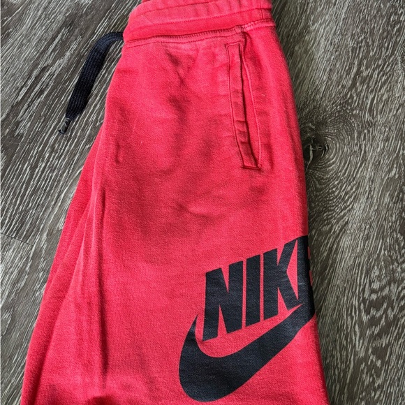 Nike Adult Red Jogger Shorts - Picture 1 of 2